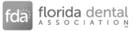 Logo for fda - Florida Dental Association in gray and white